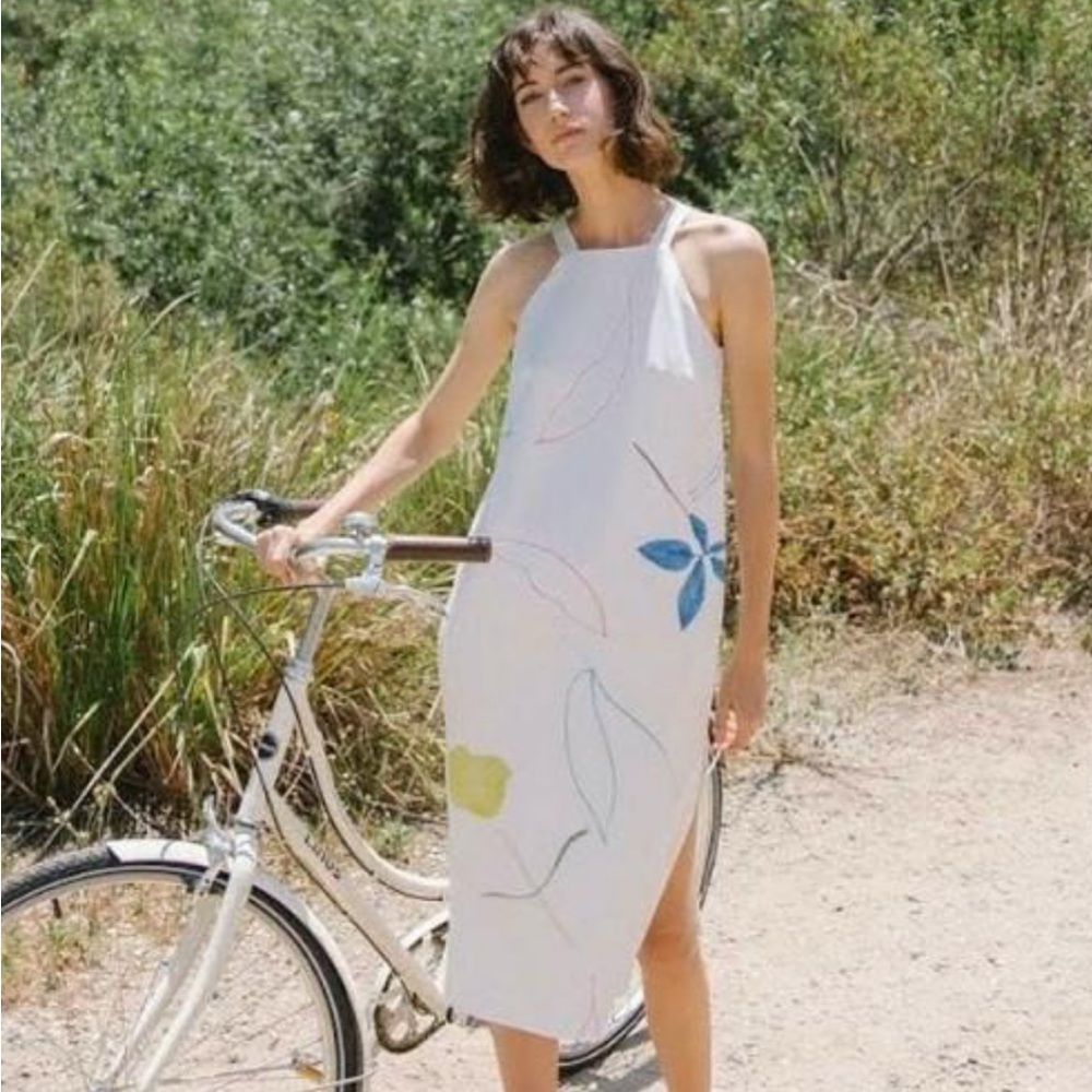 Elegant White Midi Dress with Floral Accents